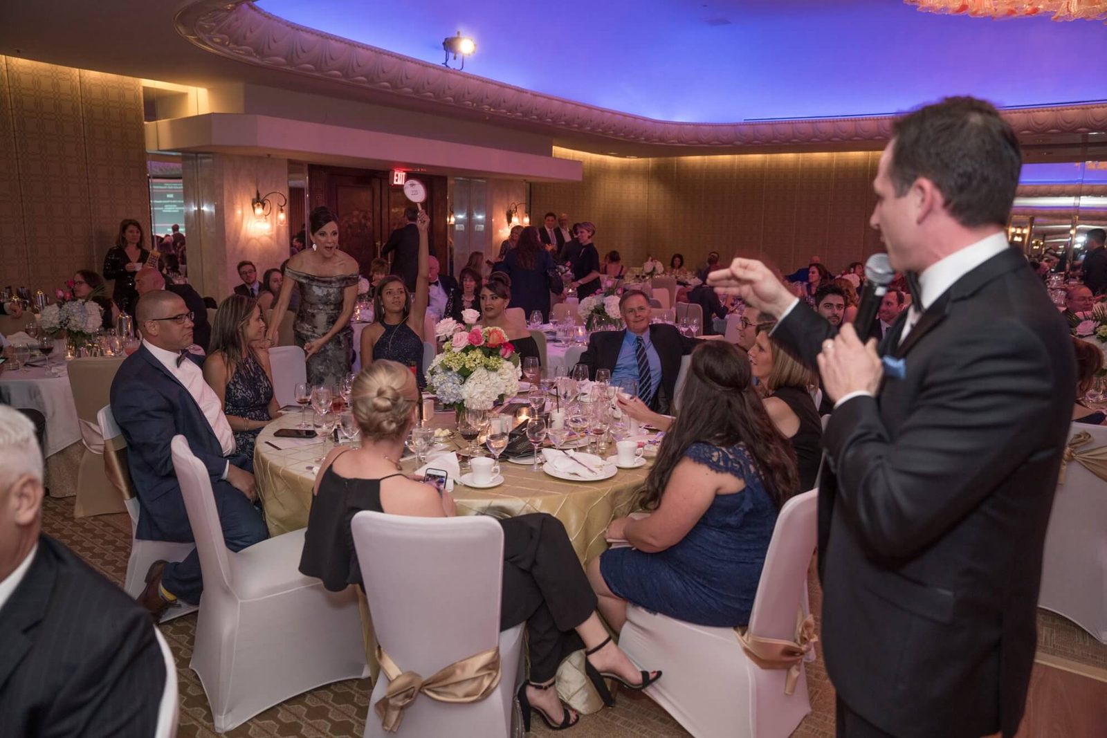 Johnny ‘Bravo’ Holloway on the microphone at a Houston event